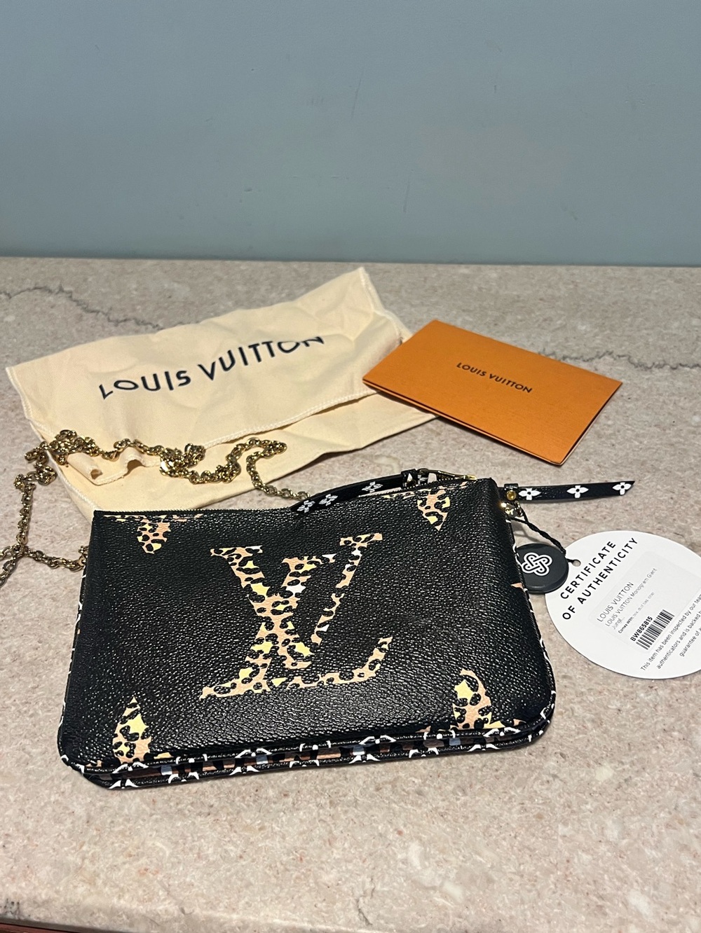 LOUIS VUITTON
Double Zip Jungle Pochette Giant Monogram Leather Crossbody Bag - Picture 3 of 15